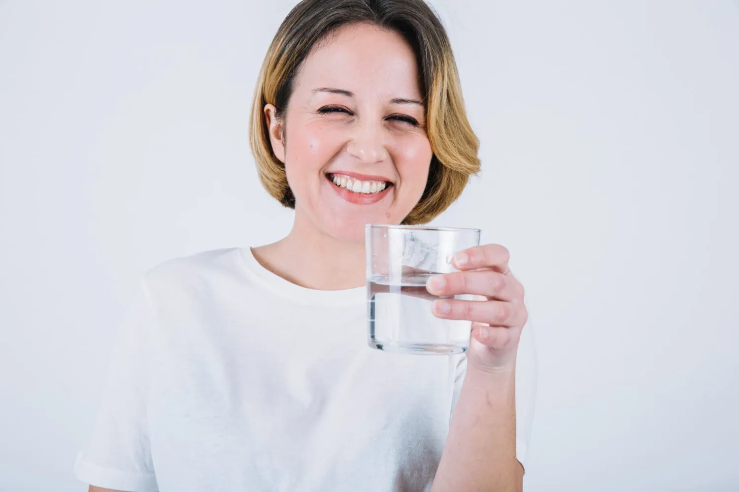 cheerful-woman-with-water-white-background